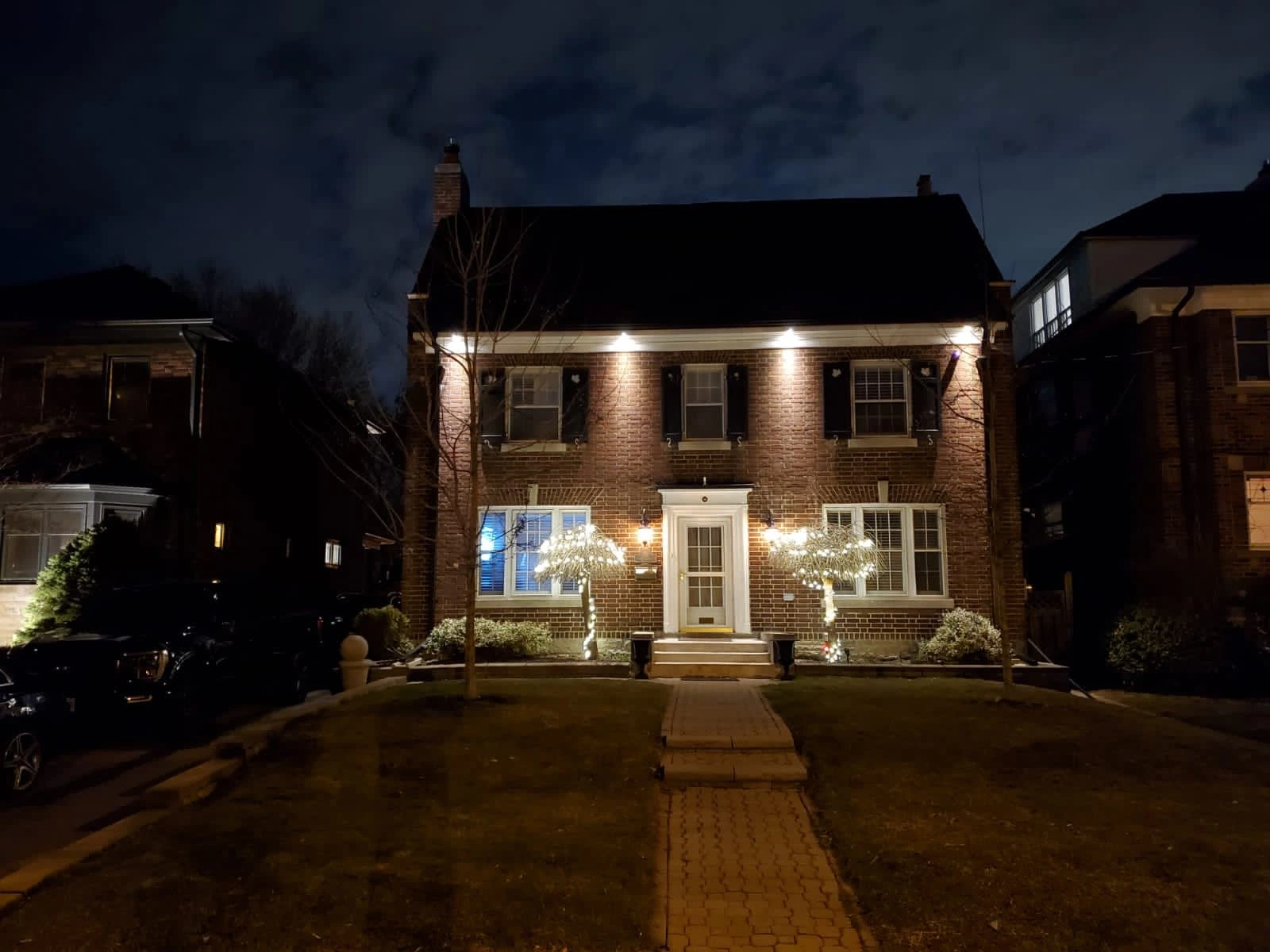 A completed LA Plus exterior lighting project at dusk